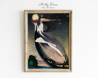 May include: A framed art print of a woman in a flowing gown holding a bowl of fruit. The woman is surrounded by a dark blue and purple sky with stars and a full moon. The print is titled "Misty Deco Fine Art Prints".