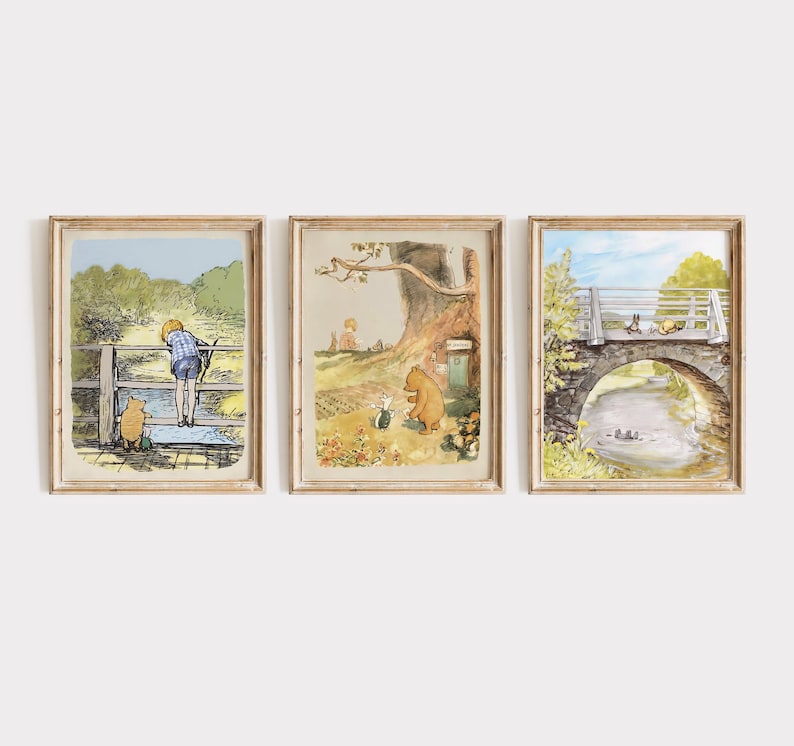 May include: Three framed illustrations of scenes from Winnie the Pooh. The first shows Winnie the Pooh and Piglet walking in a forest. The second shows Christopher Robin looking at a river. The third shows Winnie the Pooh and Piglet walking across a bridge.
