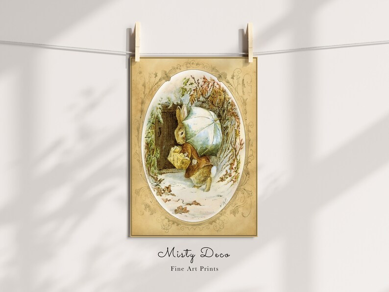 May include: A vintage illustration of a brown rabbit holding an umbrella and a basket, walking through a snowy woodland scene. The illustration is framed in a gold oval with ornate details.