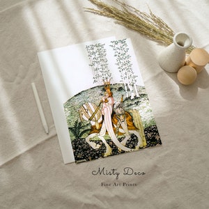 May include: A fine art print of a woman in a crown riding a white horse through a forest. The print is on a white background and has the text "Misty Deco Fine Art Prints" at the bottom.