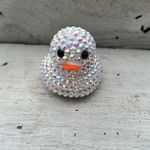 Patito de goma con diamantes de imitación iridiscentes blancos, patito deslumbrante
