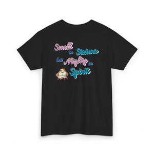 May include: Black t-shirt with a cartoon character and the text "Small in Stature but Mighty in Spirit" in colorful, stylized lettering.