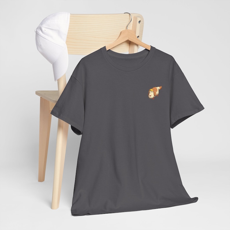 May include: A dark gray t-shirt with a small embroidered image of a cartoon dog on the left chest.