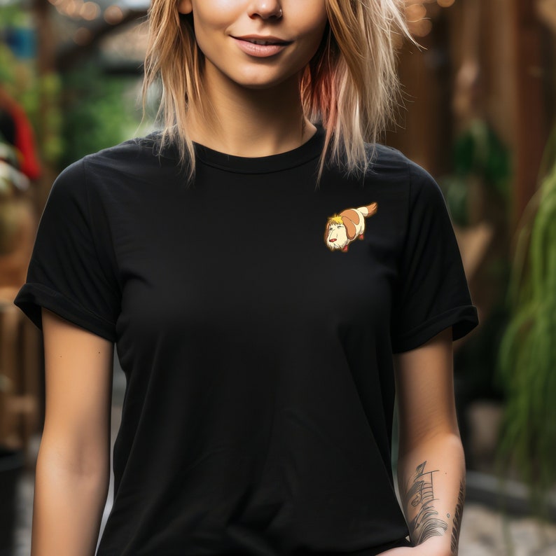May include: A black t-shirt with a cartoon dog illustration on the left chest.