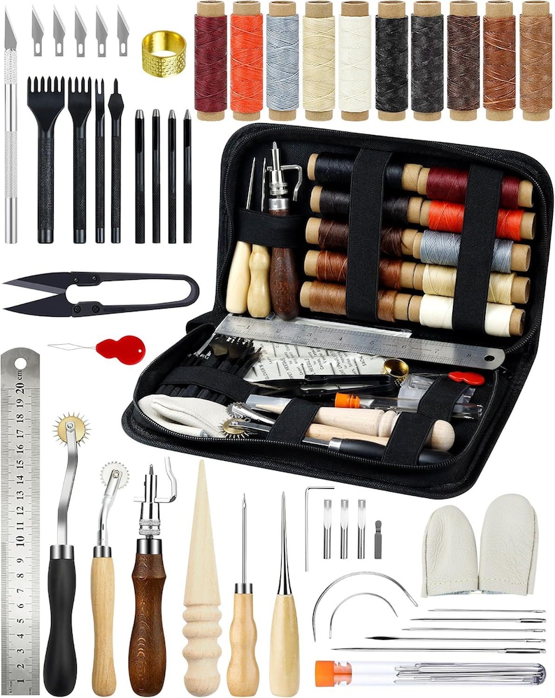 May include: A comprehensive leathercraft tool kit featuring various tools, including needles, awls, scissors, and a ruler. The kit includes spools of thread in multiple colors, a thimble, and a black zippered case. The ruler is 20 cm long.