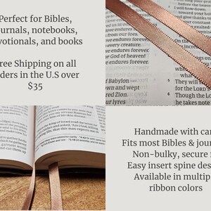 May include: A close-up of an open book with a ribbon bookmark. The ribbon is a light brown color. The text on the page is visible. The image also includes text that says "Handmade with care" and "Fits most Bibles & journals".