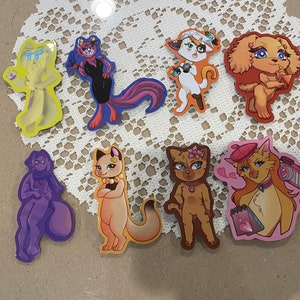 May include: Set of nine colorful cartoon animal stickers featuring a variety of poses and expressions. The stickers are printed on a clear background and are perfect for adding a touch of whimsy to any project.