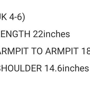 May include: Size XS (UK 4-6) jacket measurements: 22 inches in length, 18.8 inches from armpit to armpit, and 14.6 inches across the shoulders.