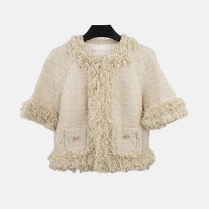Handmade tweed boucle ivory short sleeve jacket with fluffy trim