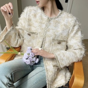 Handmade Ivory Relaxed Fit Tweed Jacket with Gold Buttons & Flap Pockets | Close-up of Fabric with Silver Thread Woven Detail