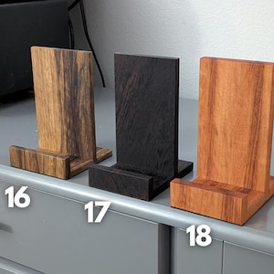 Handcrafted wooden now playing stand for vinyl records – stylish turntable accessory to display your current album in natural hardwood; perfect for audiophile decor and vinyl enthusiasts. Featuring black limba, wenge, and tigerwood. Numbered 16-18