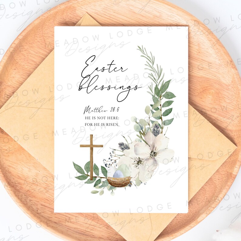 May include: A white card with a watercolor floral design and a cross. The text reads "Easter Blessings" and "Matthew 28:6 He is not here: For he is risen."