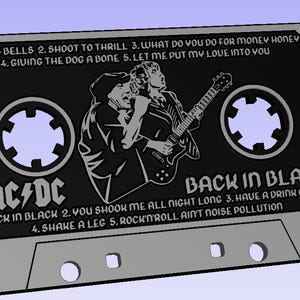 May include: A black cassette tape with a silver case. The tape has a black and white image of a rock band with a guitar. The text "AC/DC" and "Back in Black" are printed on the tape. The song titles are listed on the tape: "Hells Bells", "Shoot to Thrill", "What Do You Do For Money Honey", "Giving The Dog A Bone", "Let Me Put My Love Into You", "Back in Black", "You Shook Me All Night Long", "Have A Drink On Me", "Shake A Leg", and "Rock'n'Roll Ain't Noise Pollution".