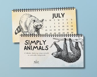 May include: A calendar featuring a raccoon and a sloth on a watercolor background. The calendar is titled "Simply Animals" and has the month of July displayed.