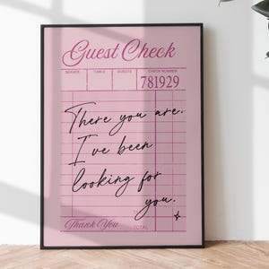 May include: A pink and white guest check with black text that reads "Guest Check", "There you are. I've been looking for you." and "Thank You". The check number is 781929.
