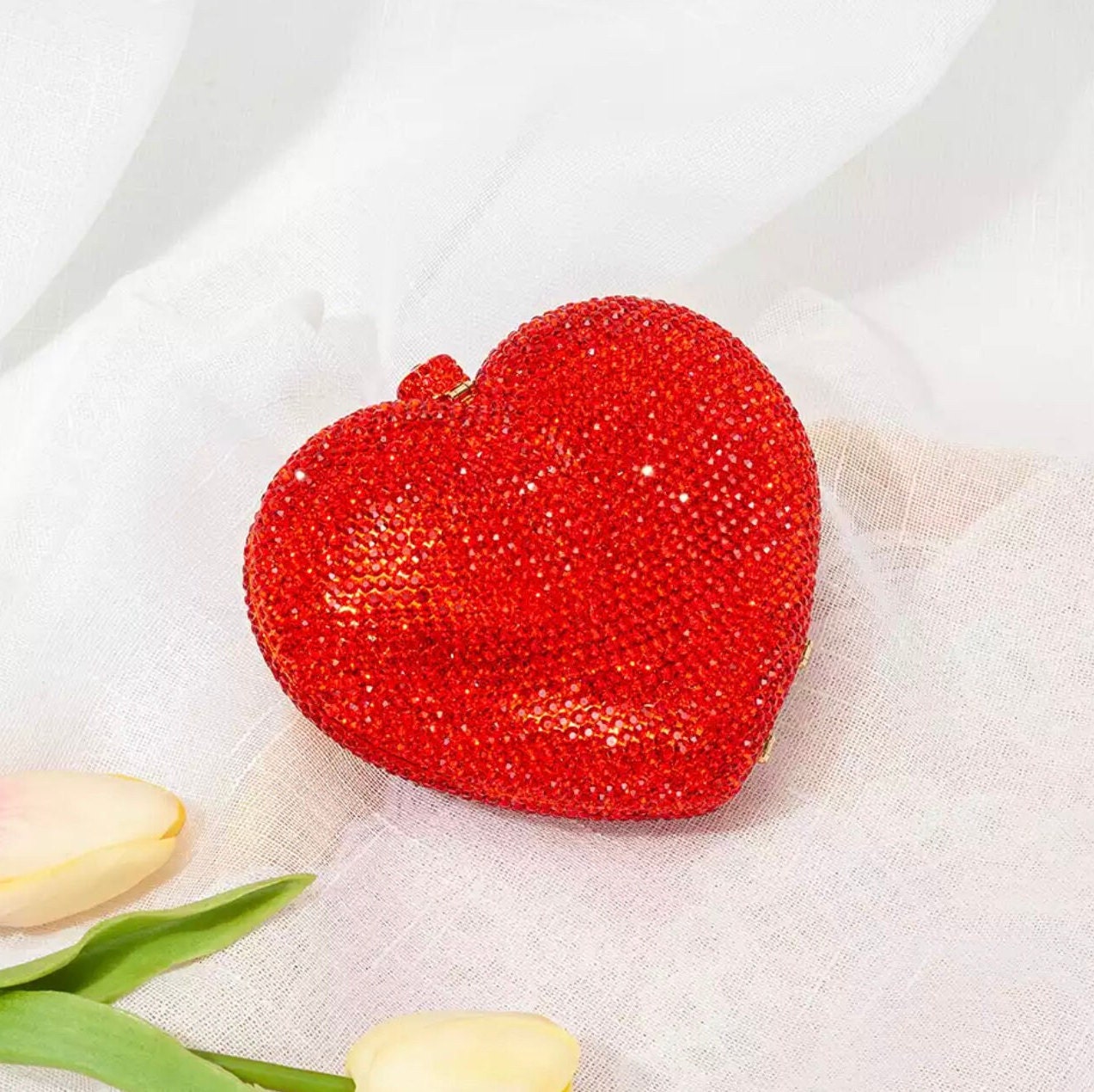 Heart shaped clutch deals