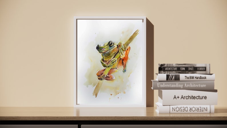 May include: A watercolour painting of a green tree frog sitting on a branch. The frog has orange feet and is looking to the left. The painting is framed in a white frame.