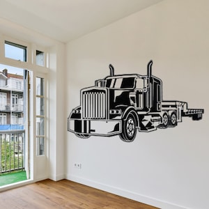 May include: Black and white silhouette of a semi-truck with a flatbed trailer on a white wall.