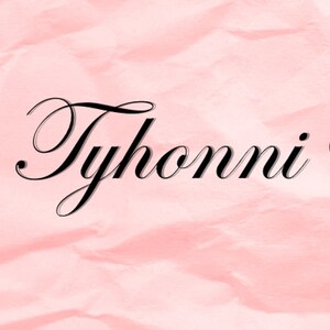 May include: A pink and white background with a black and white bow and the text "Tyhonni" in cursive with a black heart.