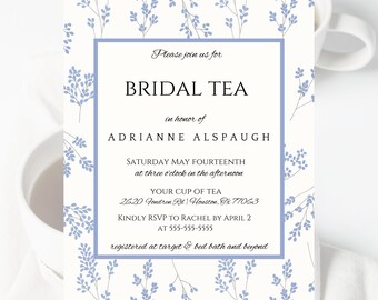 May include: A floral-themed bridal tea invitation. The invitation features a light blue border and delicate blue floral accents on a cream background. Text includes "BRIDAL TEA" and event details.