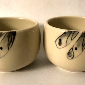 2 x Glazed Porcelain Sake cups with funky fish design, asian