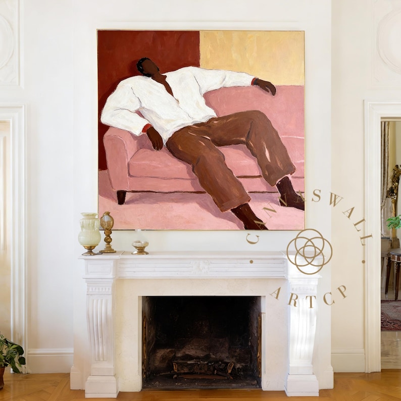 May include: An oil painting depicts a person reclining on a pink sofa. The person wears a white shirt and brown pants. The background is divided into red and gold sections. The artwork is displayed above a white fireplace.
