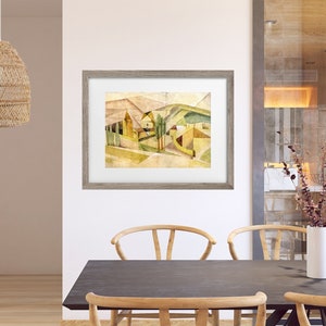 Peut inclure: Une peinture abstraite &agrave; l'aquarelle encadr&eacute;e repr&eacute;sentant un paysage avec des formes g&eacute;om&eacute;triques dans des tons de jaune, de vert et de brun. La peinture est plac&eacute;e contre un mur blanc dans une salle &agrave; manger moderne.