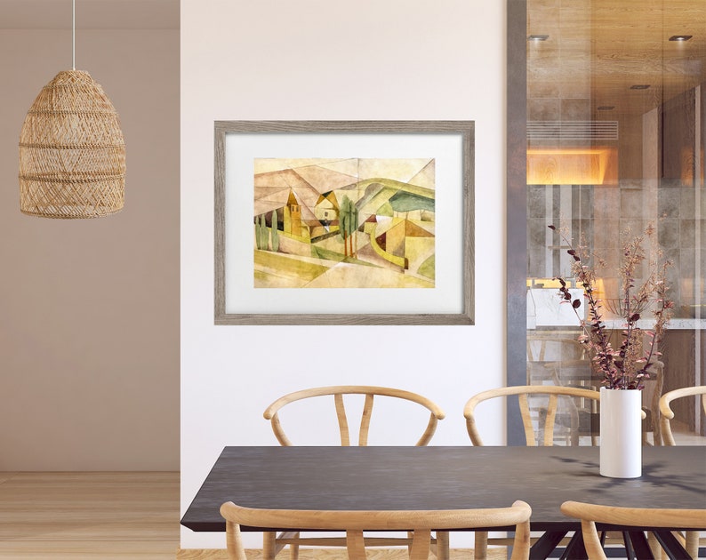 Peut inclure: Une peinture abstraite &agrave; l'aquarelle encadr&eacute;e repr&eacute;sentant un paysage avec des formes g&eacute;om&eacute;triques dans des tons de jaune, de vert et de brun. La peinture est plac&eacute;e contre un mur blanc dans une salle &agrave; manger moderne.