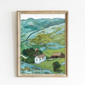 May include: A framed painting depicting a landscape with rolling green hills, a winding road, and a cluster of white and brown houses. The sky is a light blue with hints of white clouds.