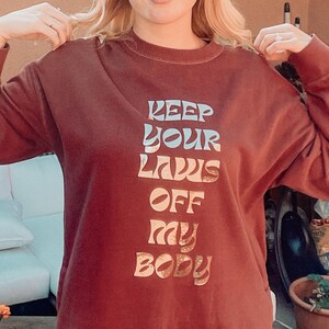 Keep Your Laws Off My Body Sweatshirt