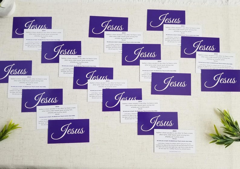 Jesus gospel tracts — Acts 4:12 Christian scripture cards with salvation prayer; mix of purple “Jesus” fronts and backs scattered on linen surface with greenery; 25-pack (25–250 options).
