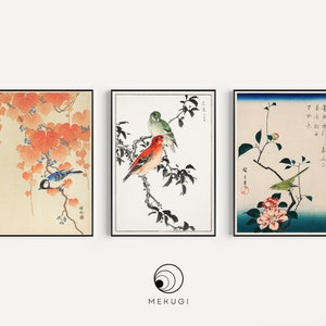 May include: Three framed Japanese woodblock prints featuring birds perched on branches with flowers and leaves. The prints are in a traditional style with delicate lines and vibrant colors.