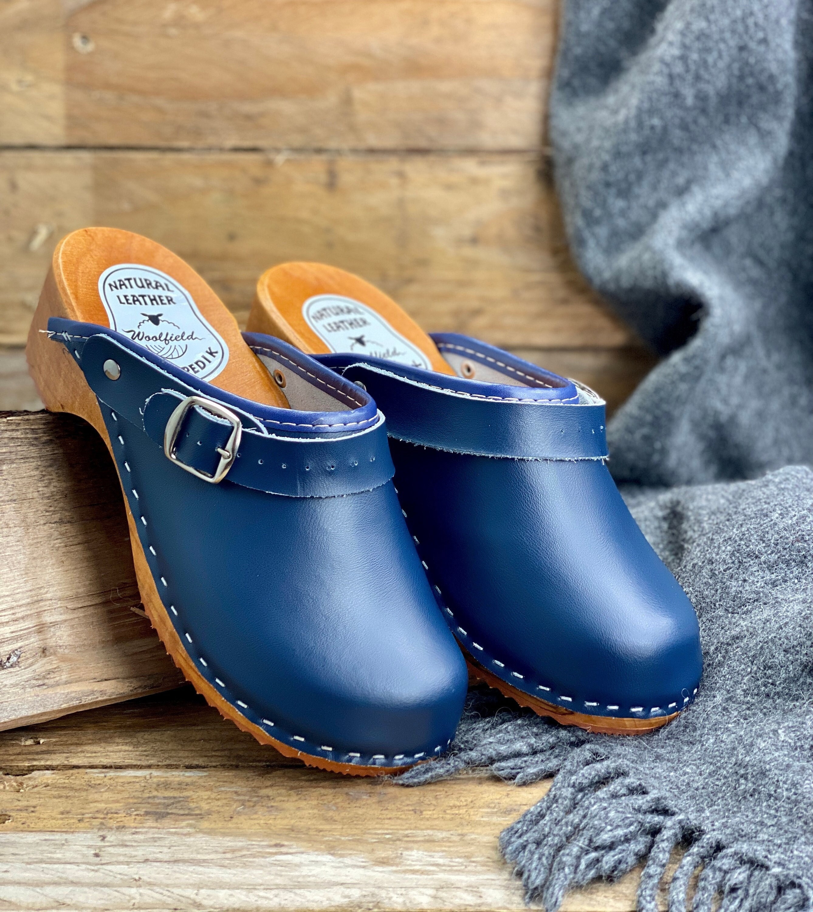 Blue leather sales clogs