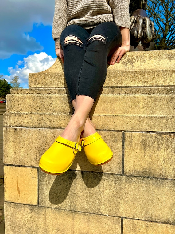 Yellow wooden best sale clogs