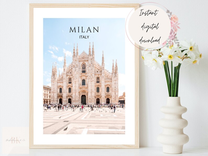 May include: A printable digital download of a photograph of the Duomo di Milano, the main cathedral in Milan, Italy. The photo shows the facade of the cathedral with a crowd of people in the square in front of it. The text "MILAN ITALY" is at the top of the image.