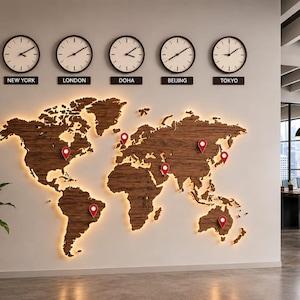 May include: A large wooden world map wall art piece with integrated backlighting, featuring red location pins placed across various continents. Above the map are five circular analog clocks labeled New York, London, Doha, Beijing, and Tokyo.