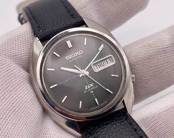 SEIKO DX AUTOMATIC Watch, Seiko Caliber 6106B ,men Watch, Clean Dial, Rare Seiko, Japan Made, 25 Jewels, Day & Date. - Etsy SEIKO DX AUTOMATIC Watch, Seiko Caliber 6106B ,men Watch, Clean Dial, Rare Seiko, Japan Made, 25 Jewels, Day & Date. - Etsy