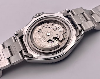 Orient Movement F6922 Vs 7s26 ORIENT Mako II, Automatic, 200M