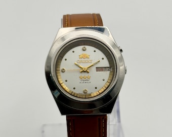 ORIENT Crystal Watch, Automatikuhr, Orient Kaliber 46943, Unisex-Uhr, klares Zifferblatt, Vintage Orient, in Japan hergestellt, 21 Steine, Tag und Datum.