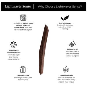 Lightwaves Sense brand infographic explaining why to choose Lightwaves Sense wooden wall hooks, featuring a mid-century modern iroko (African teak) wall hook in the center, with icons highlighting available woods (walnut, iroko African teak, beech), anti-twist two-screw mounting design, natural oil finish to enhance grain, mid-century modern aesthetic, 100% handmade craftsmanship, and a great gift idea for design lovers and new homeowners.