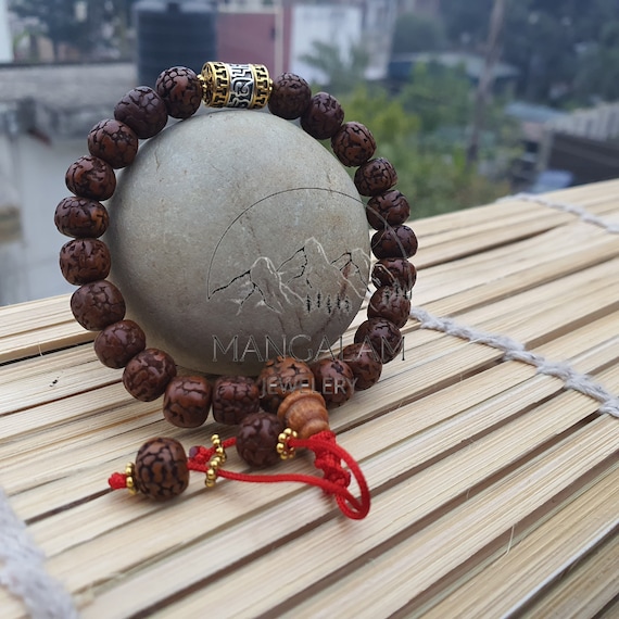METAL BEAD BRACELET W/TASSEL CHOCOLATE BROWN METAL BEAD BRACELET W/TASSEL CHOCOLATE BROWN