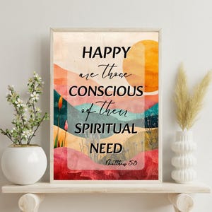 Peut inclure: Impression d'art encadrée avec un design de paysage abstrait coloré. L'œuvre d'art présente le texte "HAPPY are those CONSCIOUS of their SPIRITUAL NEED" et "Matthew 5:3". La palette de couleurs comprend des nuances de rouge, d'orange, de bleu et de vert.