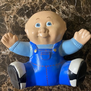 Vintage Ceramic Cabbage Patch Kid Figurine: Hand-Painted Bald Boy, 1985 Calendar