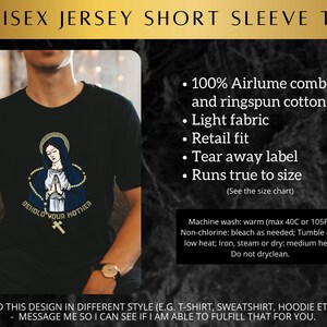 May include: Black short-sleeved t-shirt with a graphic of the Virgin Mary and the text "Behold Your Mother". The t-shirt is made of 100% Airlume combed and ringspun cotton. It has a light fabric, retail fit, tear away label, and runs true to size.