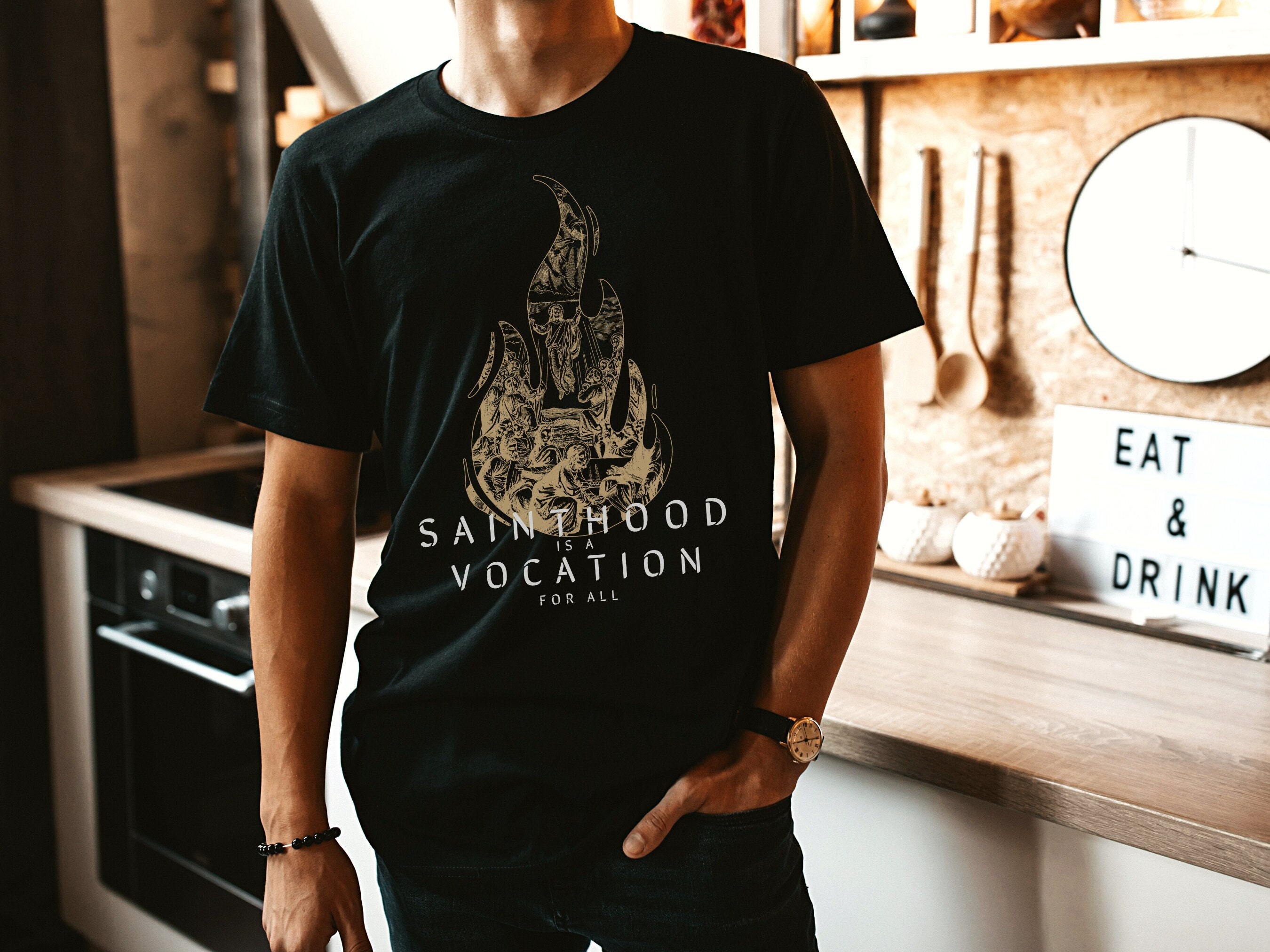 SAINTHOOD グラフィック Tシャツ Lサイズ Sainthood is a Vocation for All T-shirt for Men | We Are All