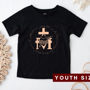 May include: Black youth-sized t-shirt with a gold graphic of a heart with a sword and roses, surrounded by a circle of stars and the text "Pray for us, O Mother of Divine Grace".