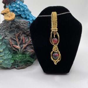 On the Reef Parrot Color Tiger Eye Pendant