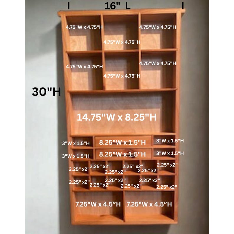 May include: A light brown wooden wall shelf with multiple compartments and drawers. The unit measures 16 inches wide by 30 inches high. It features various cubby sizes including 4.75 by 4.75 inches, 3 by 1.5 inches, 2.25 by 2 inches, and 7.25 by 4.5 inches.