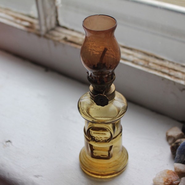 Vintage ‘post’ oil lamp - sepia toned glass