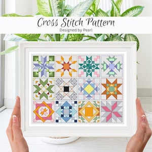May include: A framed cross stitch pattern featuring a grid of colorful geometric designs. The text "Cross Stitch Pattern Designed by Pearl" is at the top. The designs include stars, squares, and other shapes in various colors.
